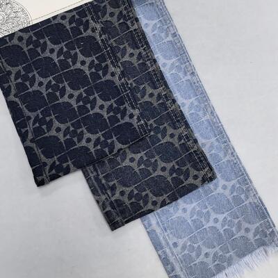 Buy 60% Cotton Four Leaf Star Blue Jacquard Knitted Middleweight Denim Fabric For Jeans 10.5 Oz online manufacture